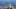 Blick über die Statue „Cristo Redentor“ auf Rio de Janeiro